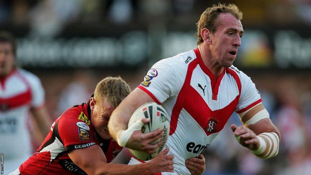 Salford's Luke Robinson tackles St Helens' Nick Fozzard during a Super League game in 2007