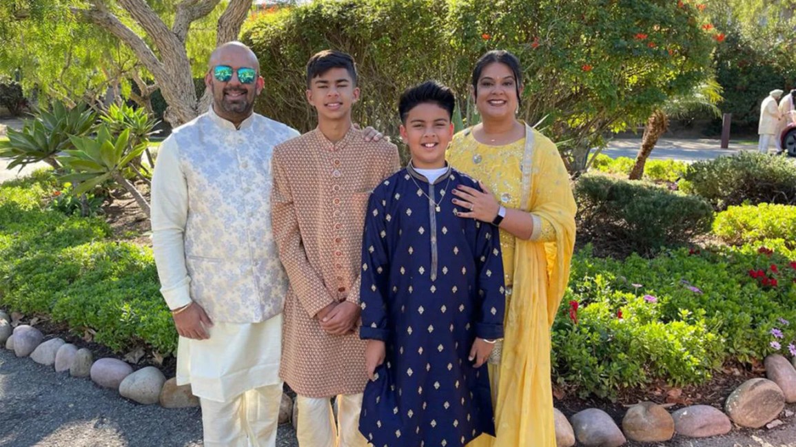 Vikas Channin (left) with his family.