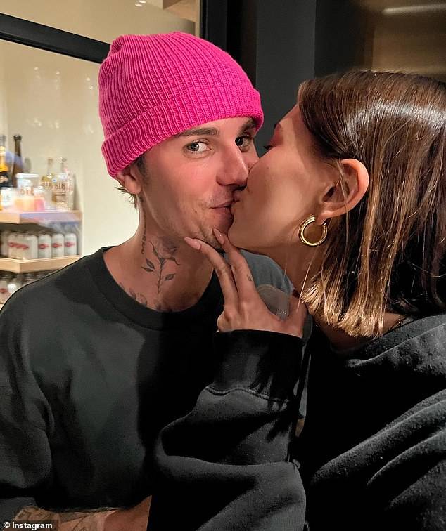 Supporting spouse: Justin Bieber is devastated by his wife Hailey's 'fragile' mental health, after months of backlash and 'death threats' from fans of his ex-girlfriend Selena Gomez